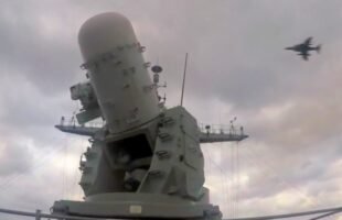 Navy CIWS Gun System Locks Onto Incoming Aircraft