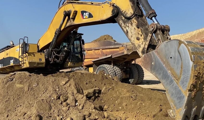 Caterpillar 385C Excavator Loading Caterpillar Dumpers – Interkat SA