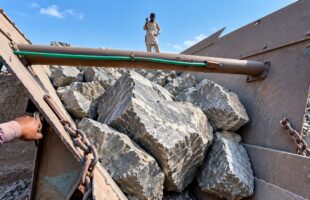 GIANT ROCKS LOADED INTO AN INDUSTRIAL CRUSHER! MASSIVE BOULDERS & HEAVY MACHINERY!